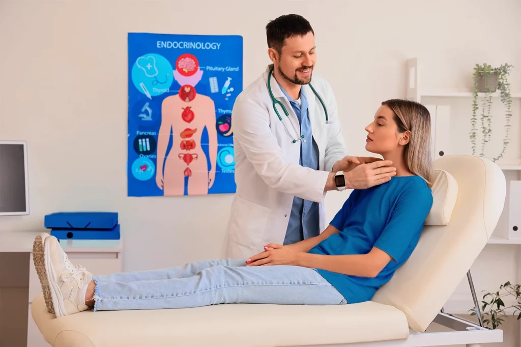 Doctor examining a patient to assess her endocrine system and identify which areas may be affected